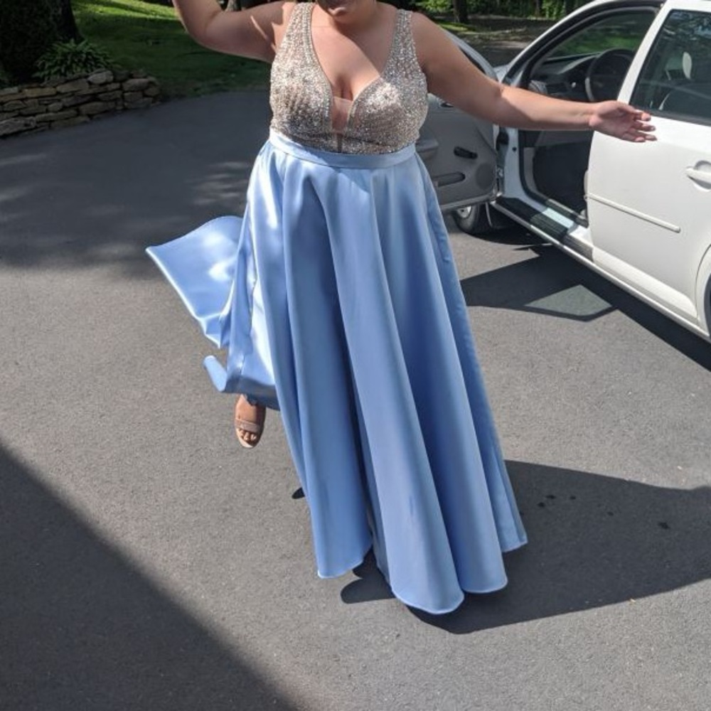 Wore once. I am very big in the chest so I had the WORST time dress shopping